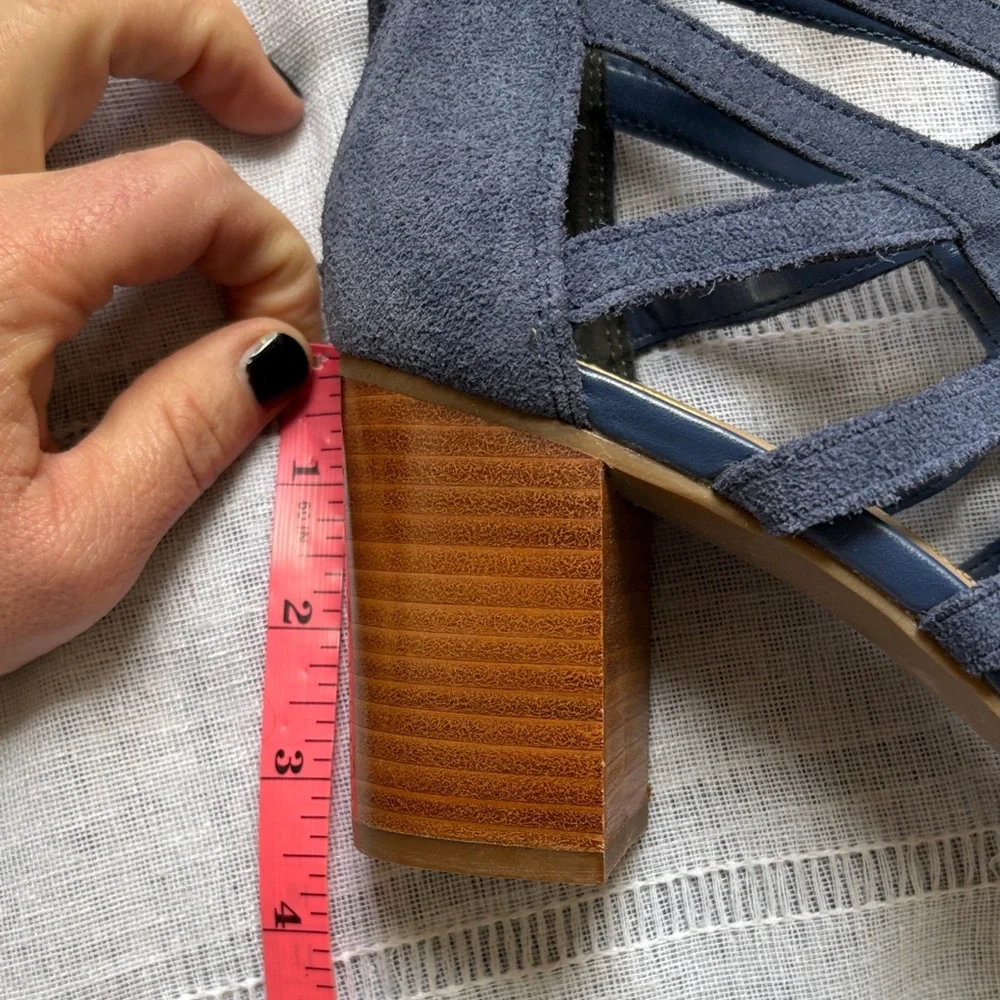 Aubrey Lynn blue suede gladiator-style heels with a tie and zip closure